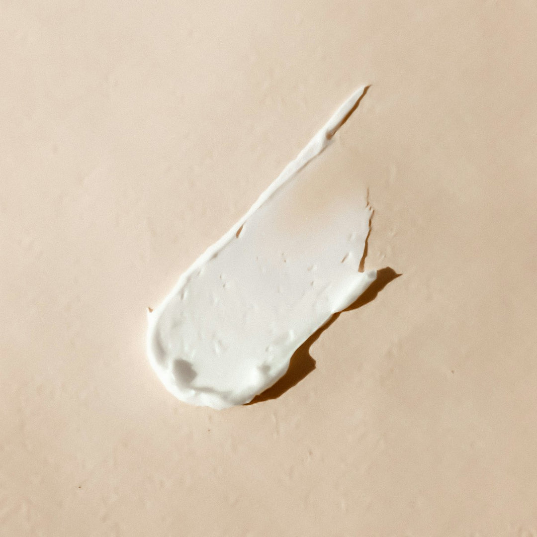 EP-TILE-SKINCARE-SQ Cream texture smear on beige